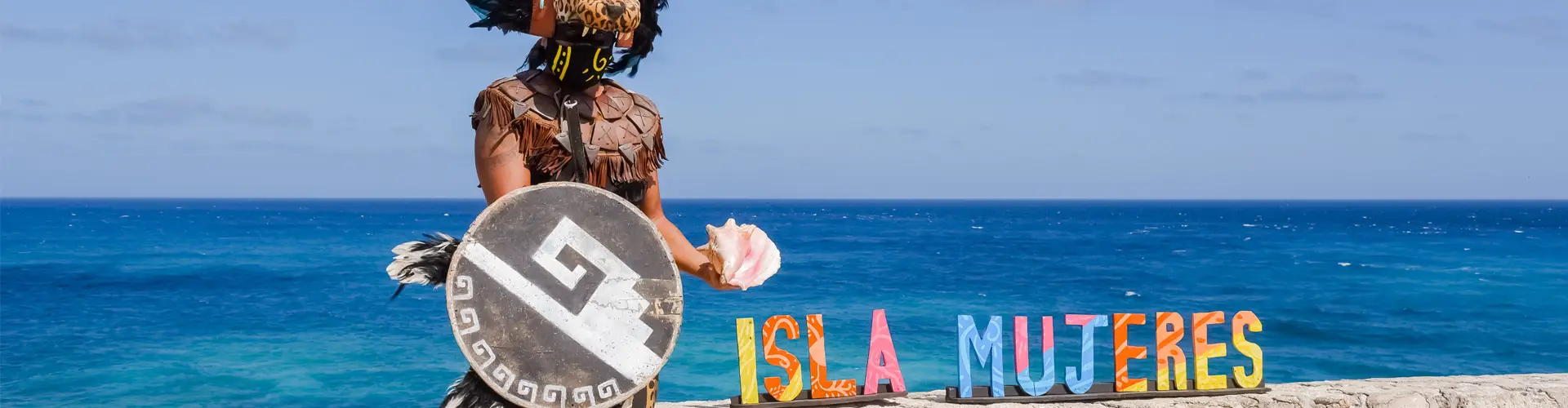 Sign Isla Mujeres by the beach