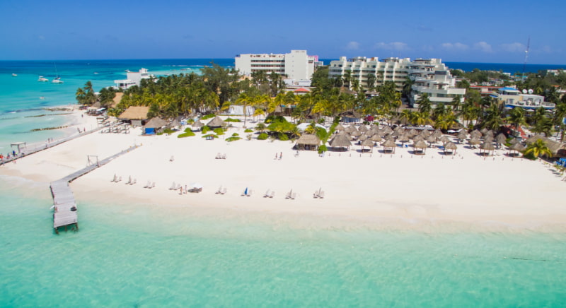 Aerial view of Playa Norte and Privilege Aluxes Hotel in Isla Mujeres